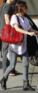 Rachel Bilson sports a chic red Satchel