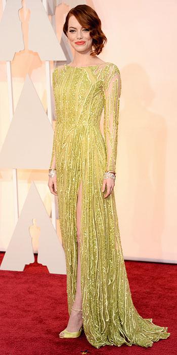 The award for the most interesting color of the night has to go to Emma Stone. This lime green Elie Saab is perfection on her skin.
