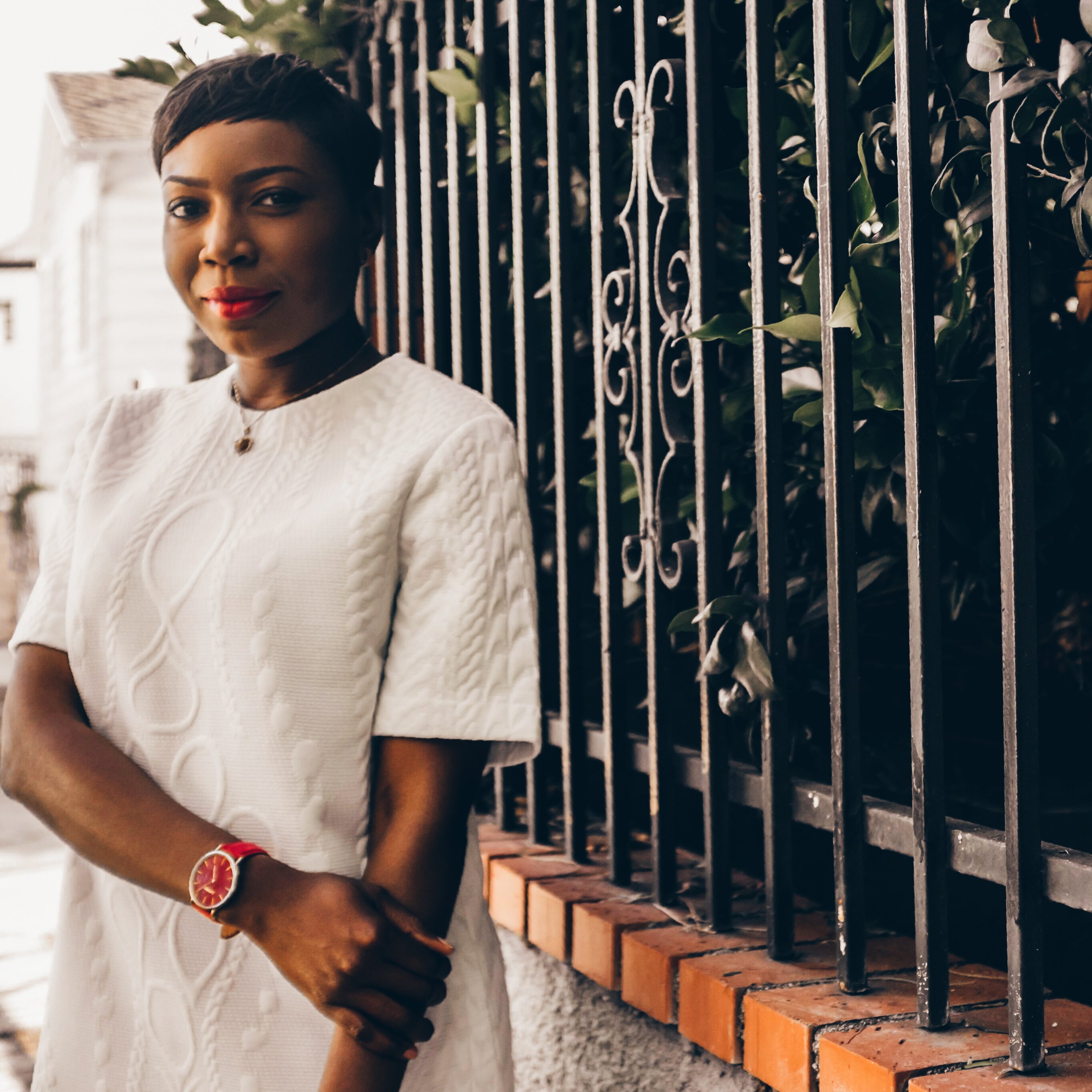 Spring and summer are also great times to sport your favorite white looks. The red SoHo adds a chic and colorful touch to this textured white dress from Zara.