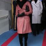 Eva Longoria in a leather trench and sky high suede boots
