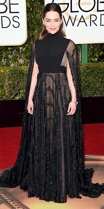 Emilia Clarke proves why she's the mother of dragons in a high neck black gown with equally dramatic cape. (Photo by Jason Merritt/Getty Images)