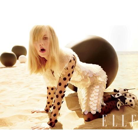 Emma Stone in dotted tulle stella McCartney Blouse and Emilio Cavallini tights