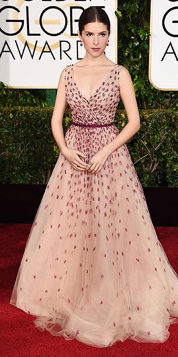 Anna Kendrick channeled her Cinderella character and opted for a princess moment as well. The Into The Woods actress went with a blush tulle Monique Lhuiller gown.