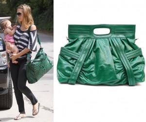 Jessica Alba is surrounded by adorable baby Honor and a stylish oversized green bag
