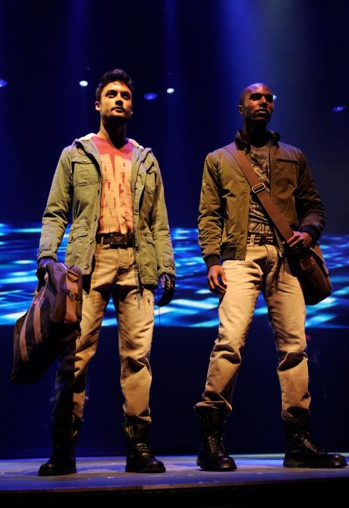 The boys at Armani Jeans were fitted in military style looks, textured sweaters, schoolboy blazers and leather jackets - rugged masculinity all the way
